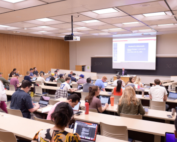 Professor teaching students in a classroom