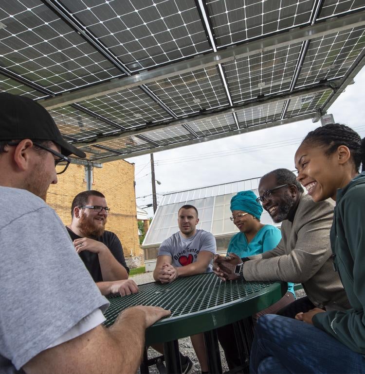 Students Sitting Outside in Community