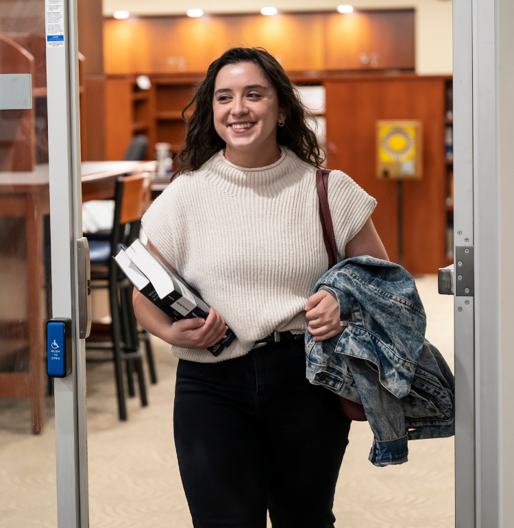 Student Walking through Door